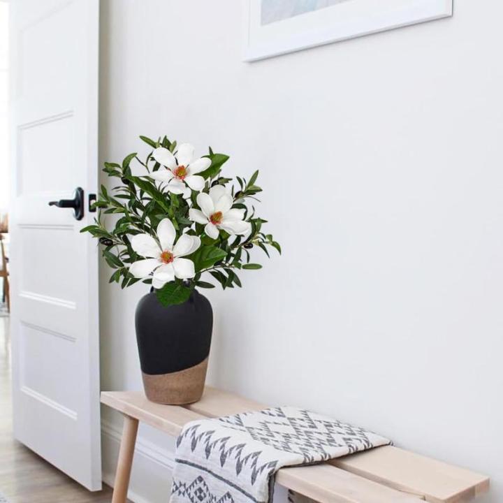 Kunstmatige olijftak met magnoliabloem