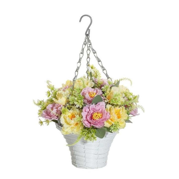 Hängende Blumenpflanze im Korb für Frühlingshochzeitsveranda-Gartenhöfe