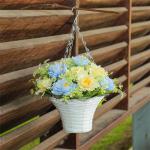 Hängende Blumenpflanze im Korb für Frühlingshochzeitsveranda-Gartenhöfe