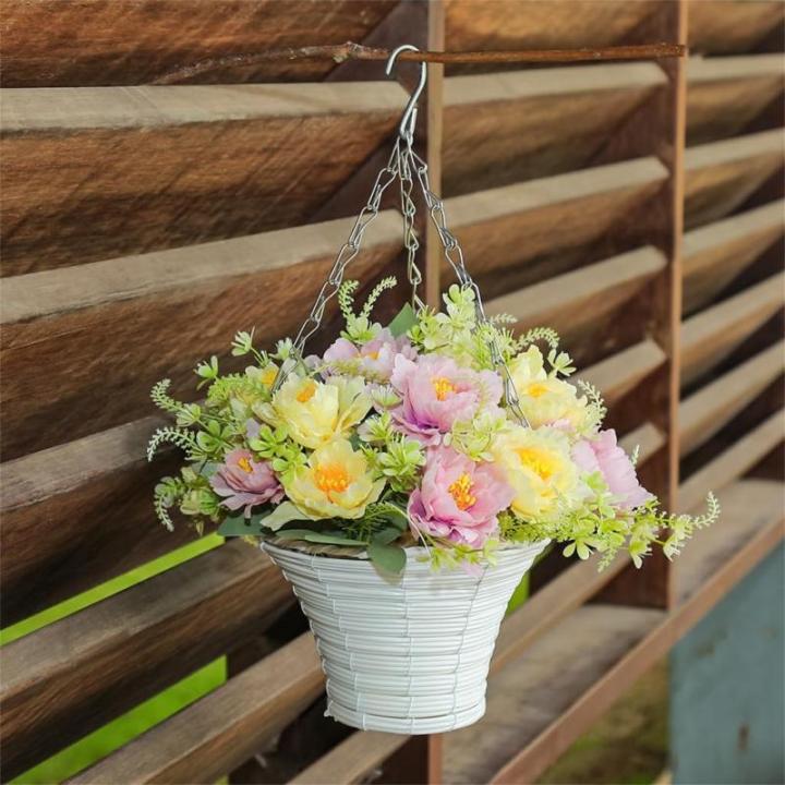 Hängende Blumenpflanze im Korb für Frühlingshochzeitsveranda-Gartenhöfe