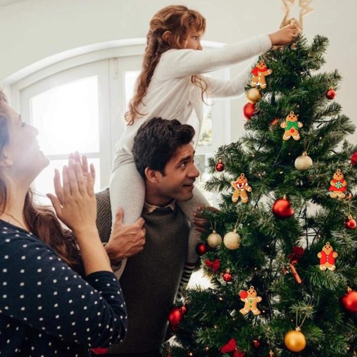 Set van 12 traditionele kerstboomversieringen rode man om op te hangen