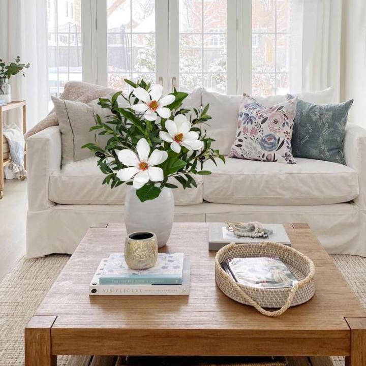 Kunstmatige olijftak met magnoliabloem