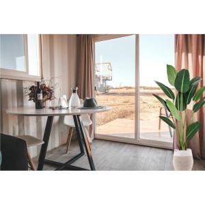 Kunstplant, kunstboom, kunstplant, decoratieve bananenplant in zwarte pot, groot en zeer realistisch, groen (150 cm)